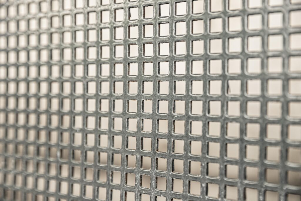Square metal mesh sheet close-up